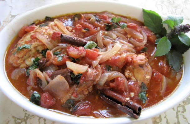 Cinnamon Basil Chicken Garnished With Cinnamon And Basil