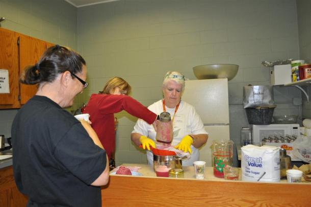 Extracting Juice From The Pomegranates Seeds