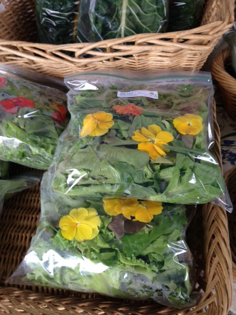 Above: Organic nasturtium blossoms bundled  up and for sale at the Aspen, Colorado Summer market 