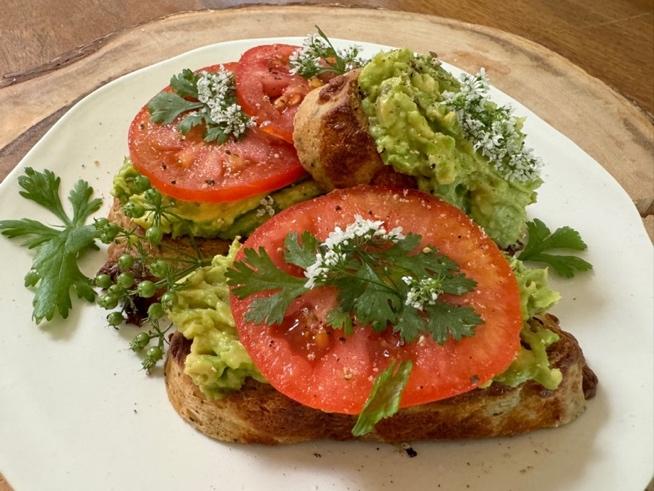 A plate of food on a wood surface

Description automatically generated